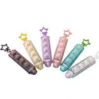 En gros, Clavier mécanique LED en acrylique 5 touches avec motif patte de chat mignon, jouet anti-stress multi-couleurs transparentes pour enfants, breloque de sac à dos