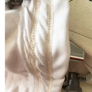 เงินฝากสำหรับ JUKIS-7823จักรเย็บผ้าสามเข็มห้าด้ายจักรเย็บผ้าความเร็วสูงมือสองจักรเย็บผ้าในสต็อก85