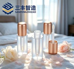 Tube de gloss à lèvres transparent métallique or rose avec bouchon à vis rond, emballage cosmétique en plastique de haute qualité - Product Image 1