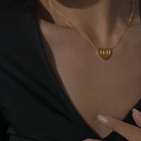 Collar de acero inoxidable tallado personalizado 18K chapado en oro Ángel número 11:11 collar con colgante en forma de corazón para joyería de mujer