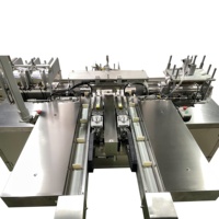 Machine d'emballage entièrement automatique à double poussée HY-200 pour l'emballage de gants, de semelles et de pansements