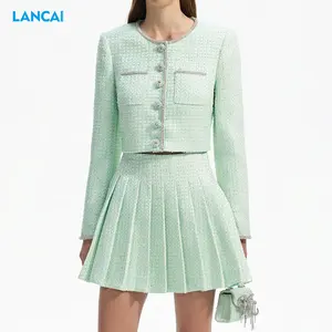 2025 femmes vêtements laine tissu veste et <span class=keywords><strong>jupe</strong></span> plissée en gros mode et élégant 2 pièces <span class=keywords><strong>Blazer</strong></span> costume pour les femmes - Product Image 1