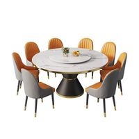 Table à manger ronde avec plateau tournant et 6 chaises d'appoint rembourrées bicolores
