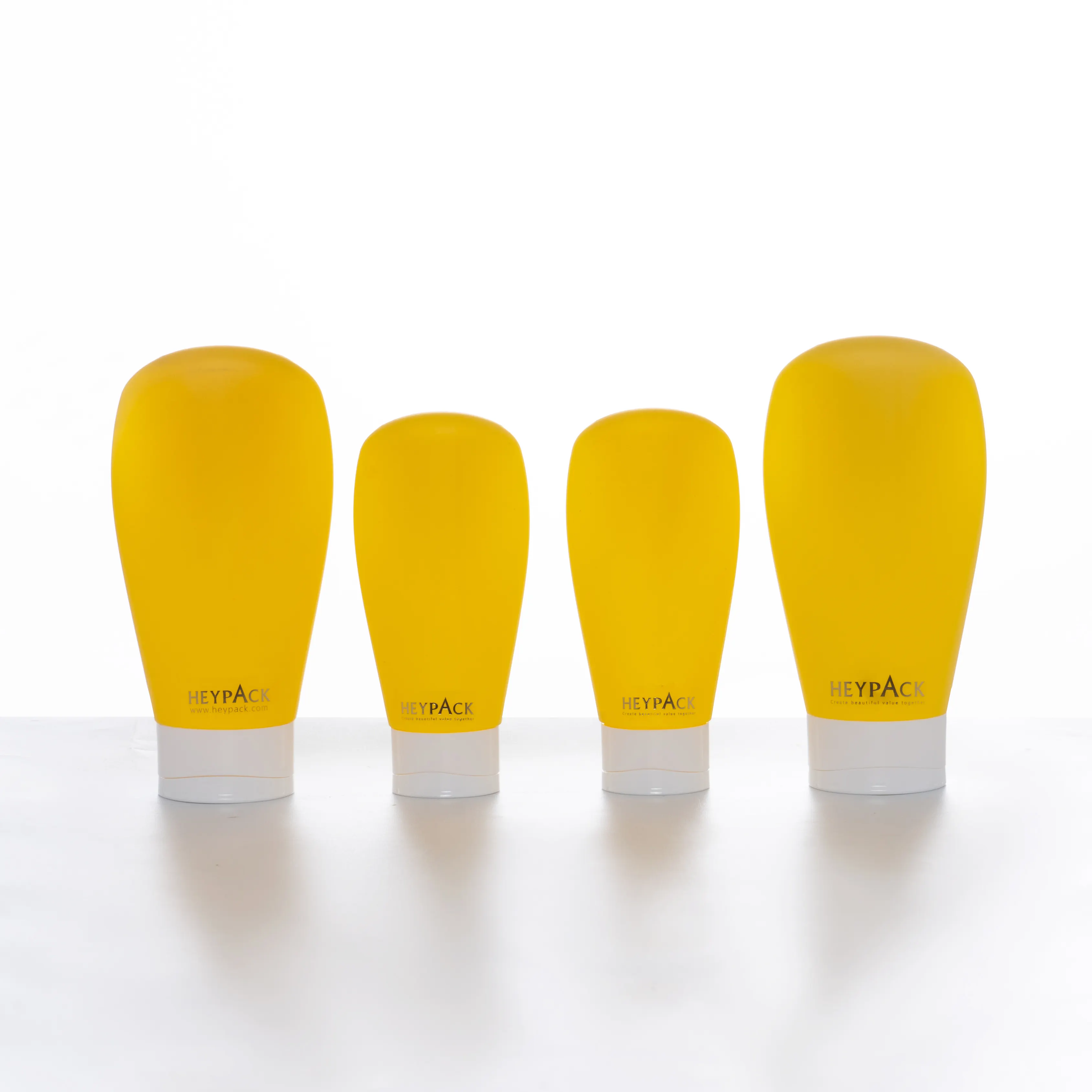 Ecológico HDPE 100 200ML amarillo Squeeze personalizado botella de loción de plástico vacía botellas de champú y acondicionador con tapa abatible