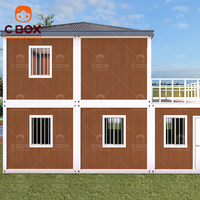 Casa Contenedor Prefabricada de Diseño Moderno y Personalizado Cbox, de Alta Calidad, de 2 Pisos, con Escaleras Exteriores, Material de Acero para Vivienda