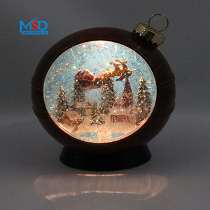 كرة ثلجية حمراء مضيئة بتصميم سانتا كلوز للأطفال مع إضاءة LED موسمية وبريق دوار للزينة الداخلية - Product Image 1