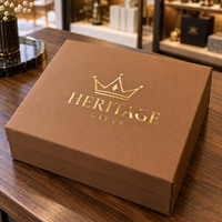 Autocollant en métal doré pour couvercles de boîtes cadeaux rigides avec des motifs d'emblèmes métalliques plats et des logos de transfert personnalisés pour l'emballage cadeau