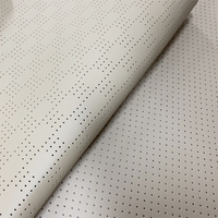 Tissu en vinyle artificiel perforé en PVC de qualité supérieure, cuir synthétique durable en rouleau pour la fabrication de sièges de voiture de course, la décoration intérieure