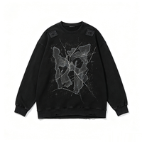 Sweat-shirt col rond noir délavé et vieilli, imprimé graphique Kornit DTG Shatter, avec détails de patchs en strass, style streetwear