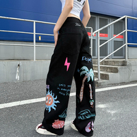 Jean en denim blanc déchiré pour homme, style américain, avec graffiti peint à la main et imprimé dessin animé, coupe ample et jambe large