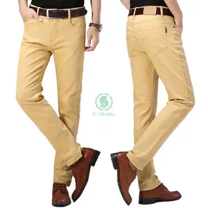 Celana panjang ramping elastis kasual pria, kaki lurus kecil dengan kain katun dekorasi kantung warna trendi 2023