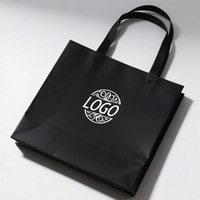 Sacs à provisions de luxe avec logo personnalisé estampage de feuille d'argent ruban de sacs en carton noir écologique pour des promotions personnalisées votre