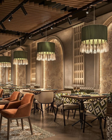 Ensembles de chaises de restaurant en métal rembourrées de luxe avec accoudoirs incurvés, design moderne pour usage commercial et hôtelier