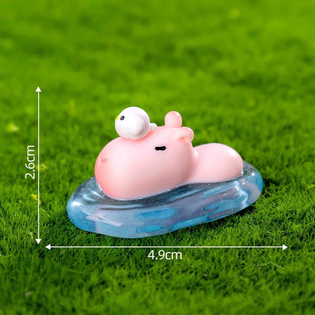 12 # Capybara rose de natation