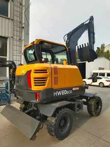 Mini-excavatrice sur roues HW60Eco jaune, capacité de la benne de 0,18 m³, moteur haute puissance de creusement, système hydraulique PLC - Product Image 2