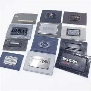 Patches de couro preto personalizado com etiquetas de logotipo gravada em metal para denim