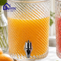 Distributeur en verre transparent de 4300 ml avec design côtelé, robinet et support sur pied pour jus, limonade, fêtes, buffets - Style américain, marque Garbo