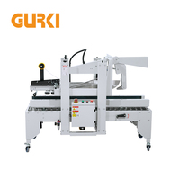 Scelleuse de boîtes en carton semi-automatique GURKI Factory, bon prix, avec ruban adhésif, pour emballage de cartons de lait, avec certification CE