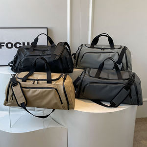 Popular Bolso de Lona Tipo Duffle para Hombre con Logo Personalizado, Mochila de Mensajero Impermeable para Fin de Semana, Gimnasio y Viaje con Compartimento para Ropa Húmeda - Product Image 1