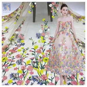 चीन थोक 3 डी फूल कढ़ाई फीता टुल कपड़े के लिए पीले लक्जरी कढ़ाई कपड़े
