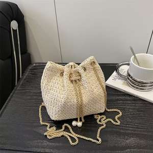 Elegant Woven <b>Drawstring</b> Bucket <b>Bag</b> with Chain Shoulder Strap - Product Image 1