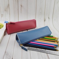 Étui à crayons cylindrique en cuir PU de couleur unie minimaliste, fermeture éclair imperméable, pochette à stylos portable, papeterie pour étudiants et professionnels