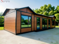 Nouvelle maison conteneur préfabriquée 2026 avec structure en panneaux sandwich galvanisés à chaud, anti-rouille, design moderne pour bureaux et appartements