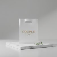 Vente en gros d'emballage sous vide en plastique ordinaire avec poignée en boucle emballage à fermeture éclair sacs scellés plat pour colis opp amidon de maïs