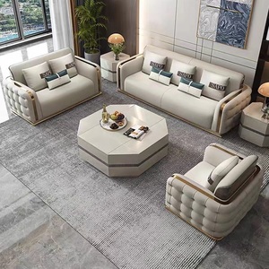 Muebles de sala de estar de lujo italianos hechos en fábrica Sofá de cuero beige con decoración de metal de acero inoxidable Juego de sofás modernos - Product Image 1