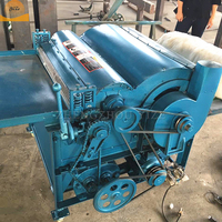 Machine de recyclage pour le déchiquetage et l'ouverture de petits textiles usagés, de chiffons, de laine, de fibres de polyester et de coton