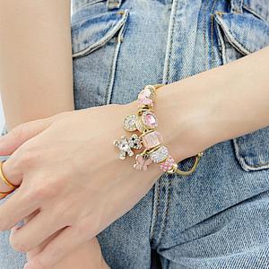 <span class=keywords><strong>Bracelet</strong></span> jonc unisexe <span class=keywords><strong>en</strong></span> acier inoxydable plaqué or 18 carats avec pendentif papillon et ours, orné de cristaux et de perles, pour une mode tendance - Product Image 3