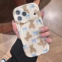 Coque de téléphone motif ours mignon et nœud crème pour iPhone 16 15 14 13 12 17 Pro 18 Pro Max, coque antichoc à bords ondulés, étui arrière