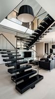 Escalier intérieur préfabriqué en acier et bois avec garde-corps en verre, durable et sûr, à monopoutre, fabriqué à Foshan