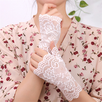 Gants mi-doigts en dentelle respirante pour femmes, élégants mitaines florales de danse, protection solaire estivale, gants sans doigts