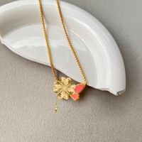 Collier Boîte à Trésors Nœud Papillon 'Amour d'Été' avec Boîte Album Ajustable et Chaîne de Clavicule en Laiton à Nœud Papillon