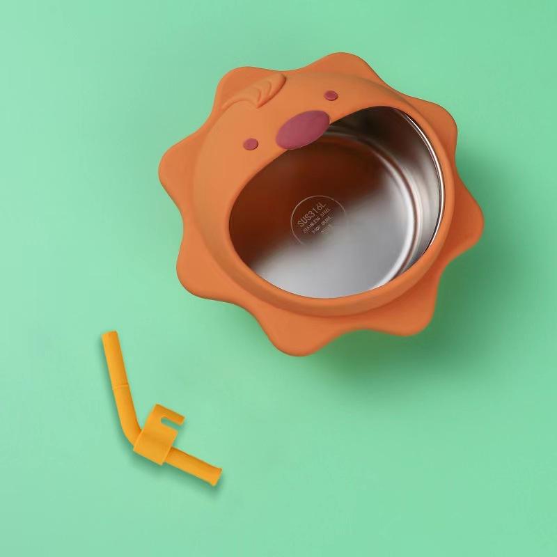 Lion with stainless steel bowl