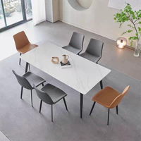 XYBF Ensemble table à manger et chaises de restaurant au design moderne Table en pierre avec finition en marbre Chaise de salle à manger en cuir PU avec pieds en métal italien