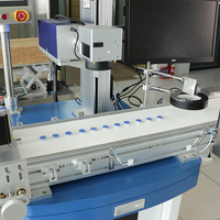 Système de marquage laser de codes QR haute précision pour bouchons de bouteilles avec inspection visuelle et rejet automatique, intégré aux SAV/ERP