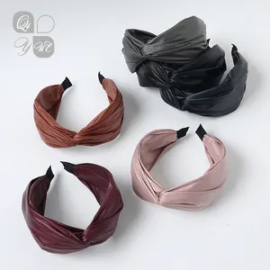Qiyue Bán buôn phụ kiện thời trang đàn hồi thời trang màu rắn Bowknot PU da nhựa Headband - Product Image 1