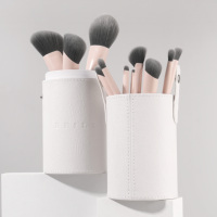 Nouvel arrivage Pinceaux de maquillage de qualité supérieure en cheveux synthétiques végétaliens 12 pièces Ensemble de pinceaux pour fond de teint en poudre rose mignon de luxe Marque privée