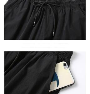 Pantaloncini da uomo pantaloni estivi 2023 Nylon sottile pantaloni 3/4 lunghezza Bermuda maschile pantaloncini lunghi da uomo neri da spiaggia ad asciugatura rapida - Product Image 6
