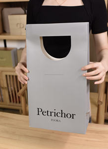 Poignées découpées à l'emporte-pièce pour sacs en papier kraft brun pour promotions et rangement de maquillage - Product Image 4