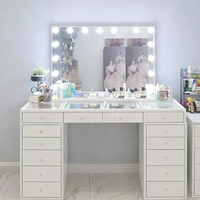 Commode de rangement moderne en bois blanc pour usage commercial, avec miroir éclairé par LED, idéale pour robes de mariée et maquillage, et table console.