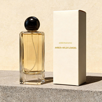 Vente en gros de flacons de parfum en verre givré personnalisés de 100 ml, couleur personnalisée, bouchon sphérique doré de luxe, vaporisateur portable rechargeable pour les voyages