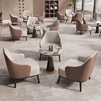 Fauteuil de salle à manger individuel en cuir, style minimaliste de luxe, pour restaurant commercial, avec table en pierre frittée pour restaurant buffet