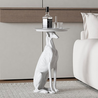 Table à thé et plateau de luxe léger de style Left-look, en résine naturelle, avec figurine d'animal sculpturale (chien), modèle pour bureaux de vente