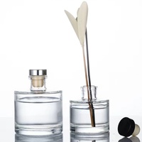 Bouteilles en verre vides de 100 ml pour l'aromathérapie avec impression sérigraphique et bouchon en caoutchouc