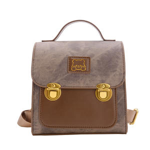 Versión coreana lindo oso bebé maletín niños Color contrastante mochila PU jardín de infantes portátil mochila de dibujos animados - Product Image 2