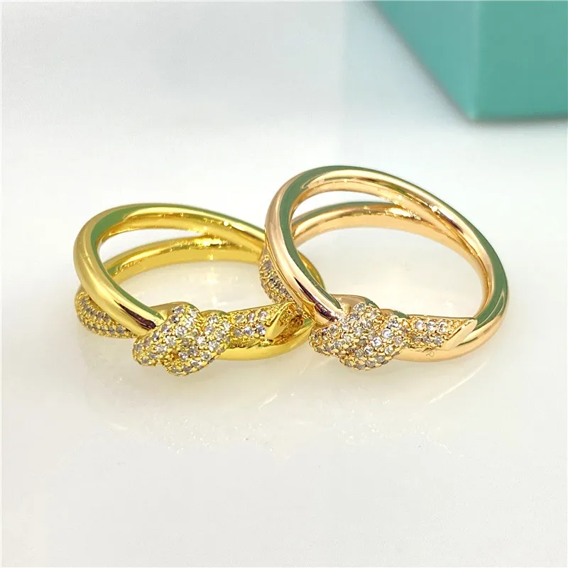 Trendy T designer brand jewelry stainless steel gold plated finger ring for Women Tarnish Free diamond zircon knot charm ring