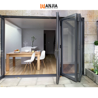 AS2047 NFRC Porte battante en aluminium à double vitrage Balcon Extérieur Aluminium Porte coulissante Bi Pliante